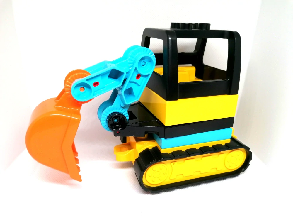 H975 DUPLO HRANÉ AUTÍČKO BAGR ŽLUTÝ S PÁSY A LŽÍCÍ